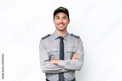 Fototapet Young safeguard man over isolated white background keeping the arms crossed in f