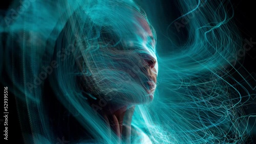 Abstract silhouette of a face, animation of the movement of light	
