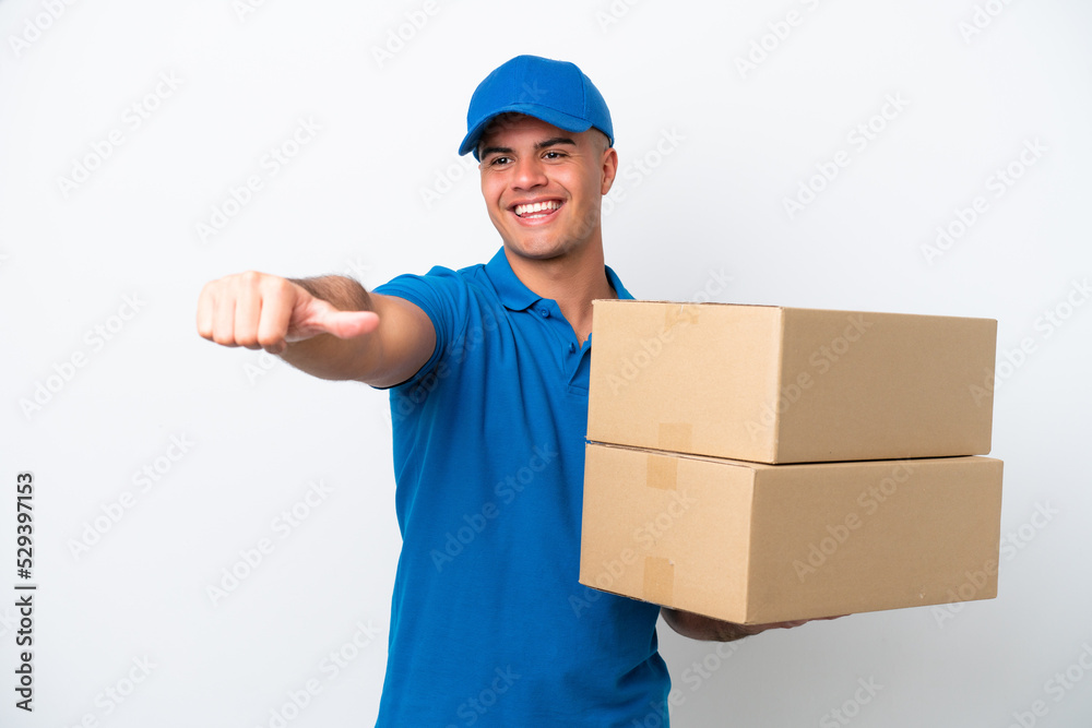Delivery caucasian man isolated on white background giving a thumbs up gesture