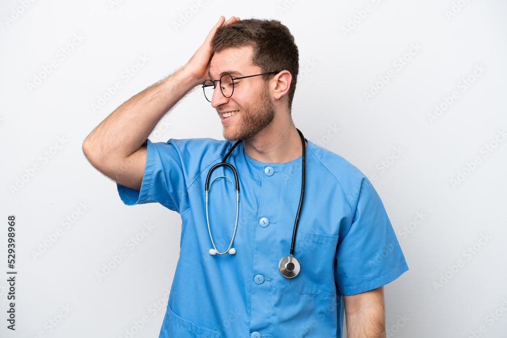 Young surgeon doctor caucasian man isolated on white background has realized something and intending the solution Young surgeon doctor caucasian man isolated on white background has realized something and intending the solution