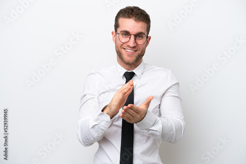 Young business caucasian man isolated on white background applauding after presentation in a conference