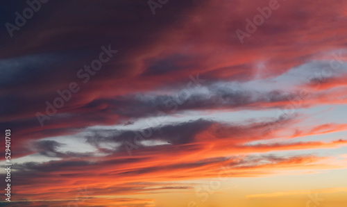 sky with clouds at sunset warm colors, beautiful sunset © PintoArt