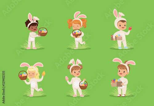 Easter with Smiling Children in Bunny Costume Playing with Decorated Eggs on Green Garden Lawn Vector Set