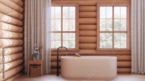 Blurred background  wooden farmhouse log cabin. Vintage bathroom with bathtub  panoramic windows  rustic interior design