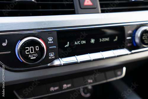 Air condition and temperature button in high end luxury car. Interior and transportation concept.