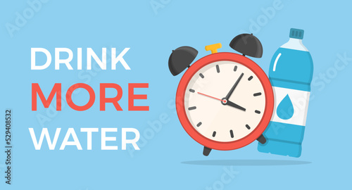 Drink more water concept - water bottle with alarm clock