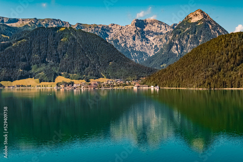 Beautiful alpine summer view with reflections at the famous Achensee lake, Tyrol, Austria