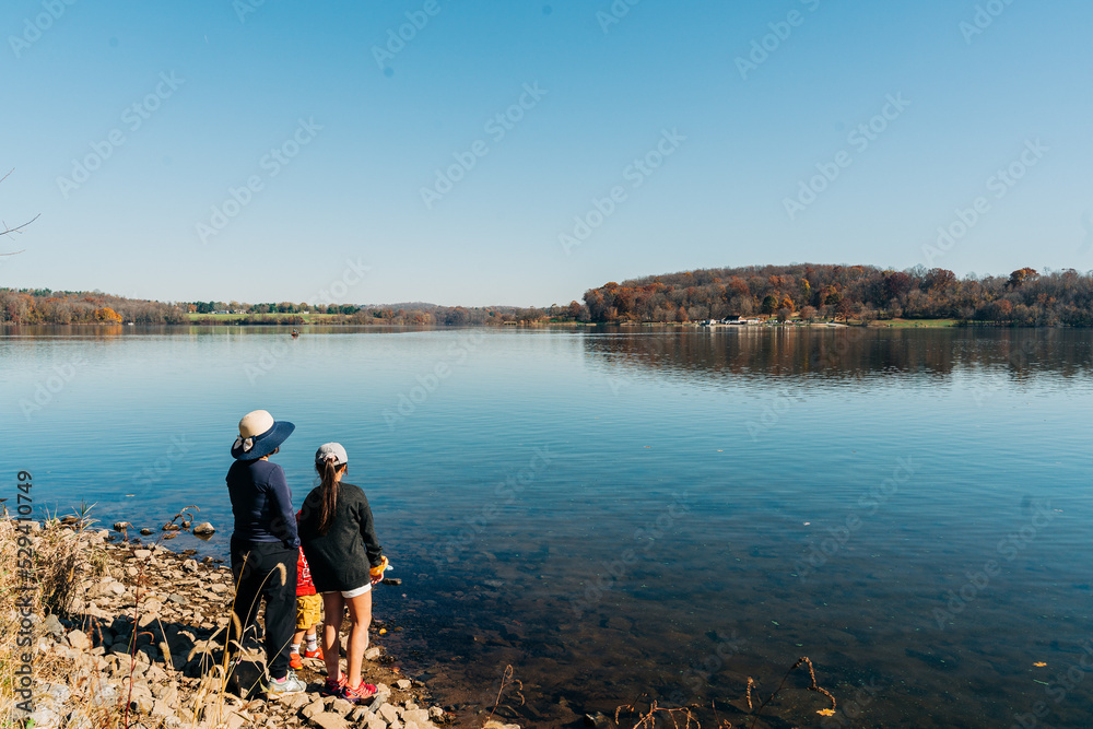 Fototapeta premium person walking on the lake