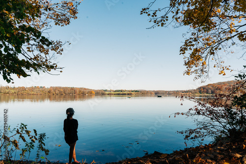 child on the lake