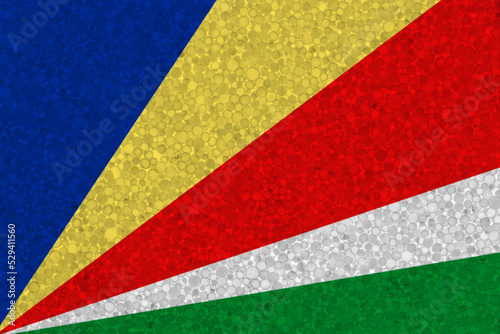 Flag of Seychelles on styrofoam texture. national flag painted on the surface of plastic foam
