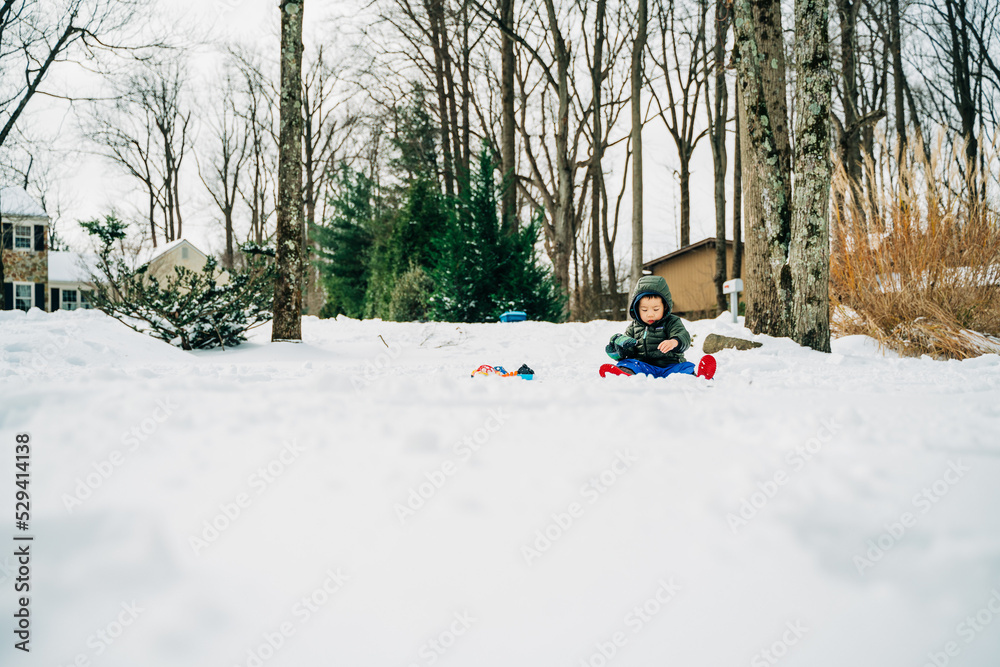 Fototapeta premium child boy playing in winter