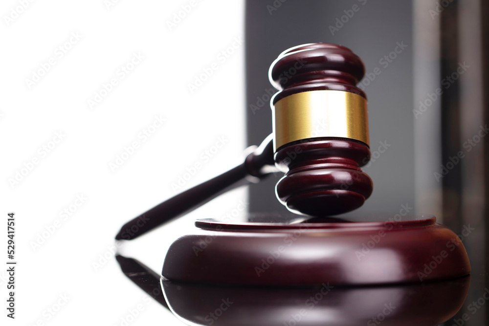 Law theme - judge office. Gavel and legal books on the judge desk. Law theme - judge office. Gavel and legal books on the judge desk.