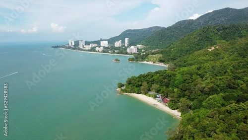 Batu Ferringhi, Malaysia: Aerial drone footage of the coast and beaches of the batu ferringhi area in the Penang island in Malaysia in Southeast Asia. Shot with a rotation motion photo