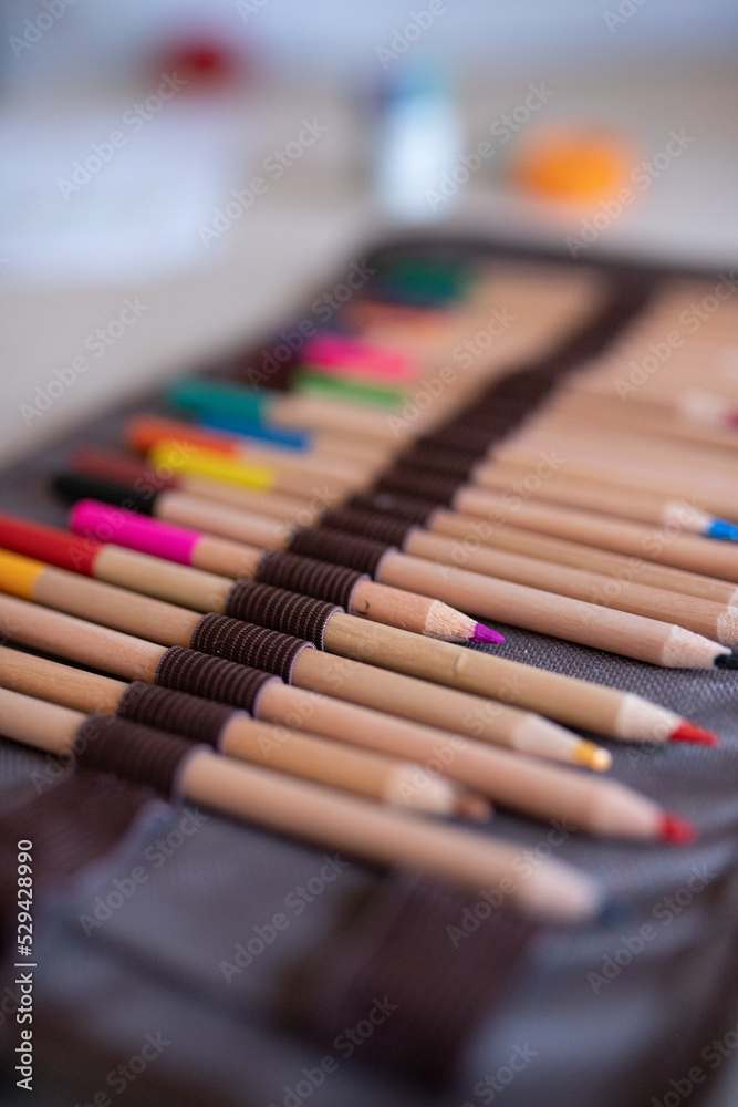 Closeup of sharpened pencils of different colors
