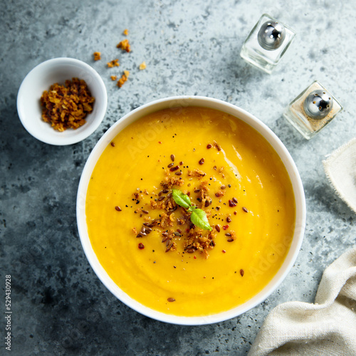 Traditional pumpkin soup with crunchy onion