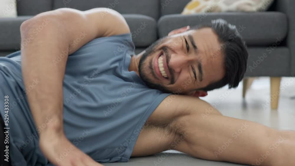 Man training body for fitness at home, sports exercise for wellness and motivation for healthy lifestyle. Strong, tired and Asian athlete doing crunches for cardio workout and performance in lounge Man training body for fitness at home, sports exercise for wellness and motivation for healthy lifestyle. Strong, tired and Asian athlete doing crunches for cardio workout and performance in lounge