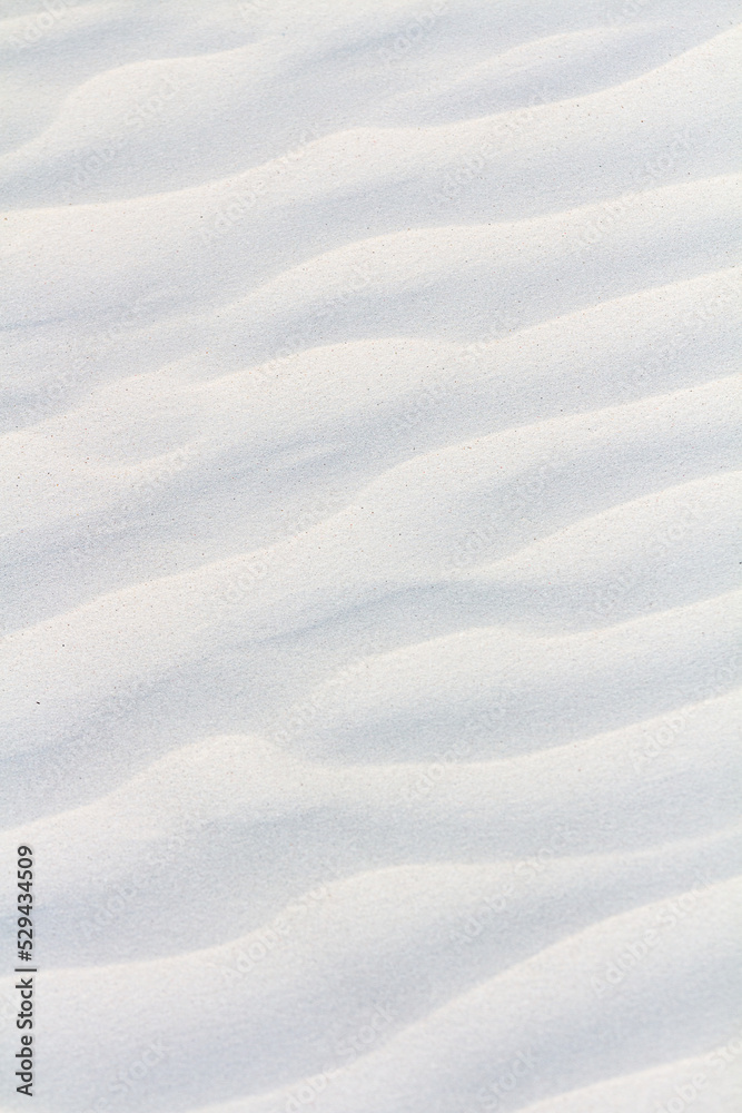 Fototapeta premium White sand texture. White sand background. vertical background 
