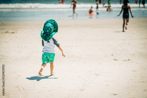 portrait of a cute boy playing at the ebach photo