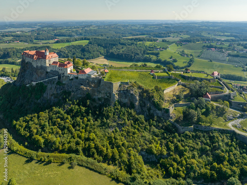 Austria - The Riegersburg castle surrounded by a beautiful landscape Located in the region of Styria from drone view photo