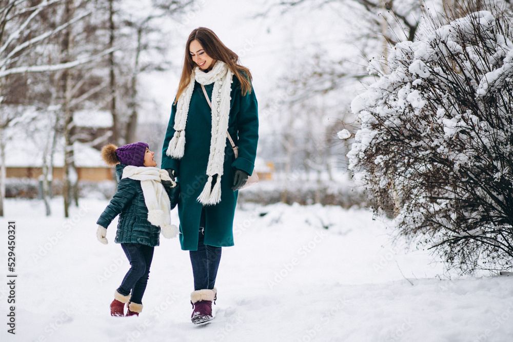 Mother and daughter in winter park Mother and daughter in winter park