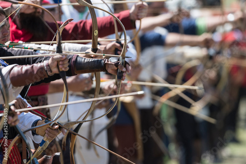 Archers lined up during a traditional archery competition at the world nomad games