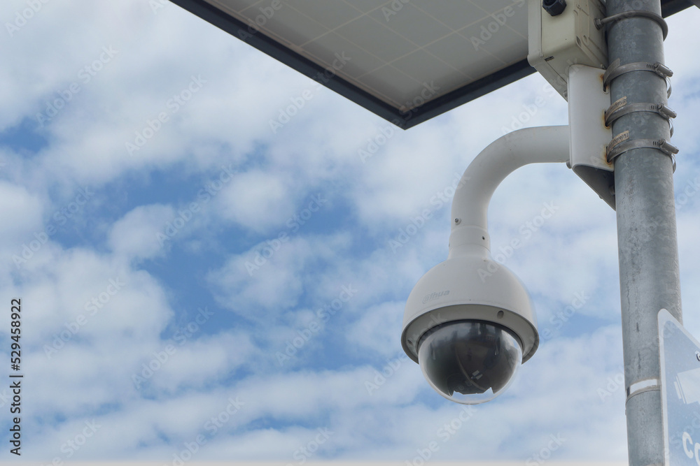 CCTV security camera operating outdoor 