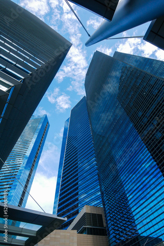 Canvas Print low angle view of singapore city buildings.