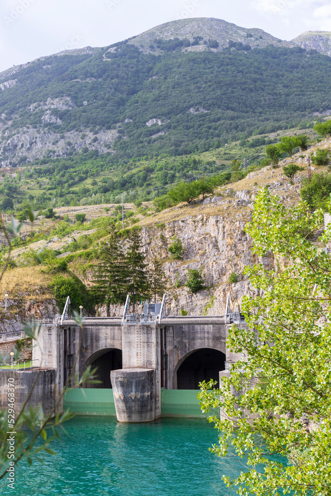 The dam of the lake of Barrea, Abruzzo, Italy. Vertical view.