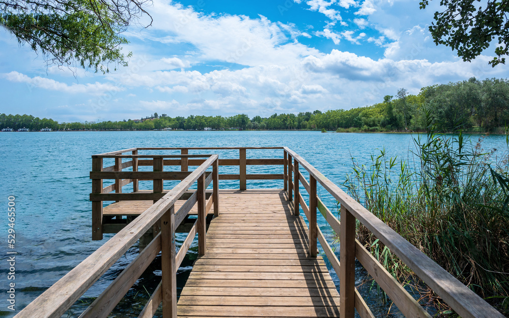Wooden footbridge with views of Banyoles lake Wooden footbridge with views of Banyoles lake