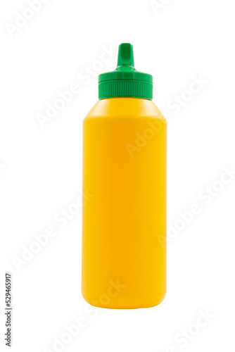 yellow squeeze plastic bottle for mustard isolated on white background