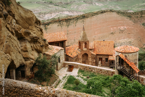 View of David Gareja Lavra orthodox monastery caves built in rock Georgia in semi-desert.  photo