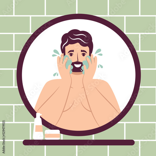 Skincare routine concept. Close up mirror reflection happy young man washes face with cleanser and soap, handsome bearded male enjoying skincare procedure. Men hygiene