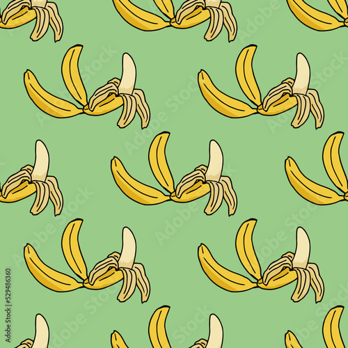 Seamless pattern with excellent banana on light green background. Vector image.