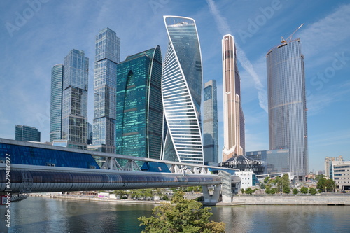 Moscow  Russia - August 12  2022  Towers of the Moscow International Business Center  Moscow-City  and the shopping and pedestrian bridge  Bagration 