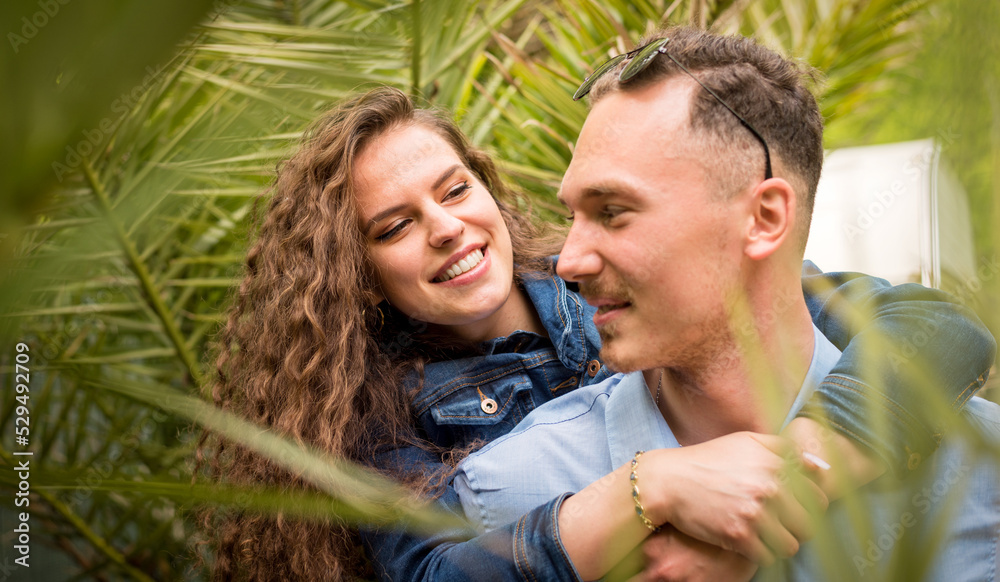 Close up poertrait of happy couple ,piggyback outdoors. Close up poertrait of happy couple ,piggyback outdoors.