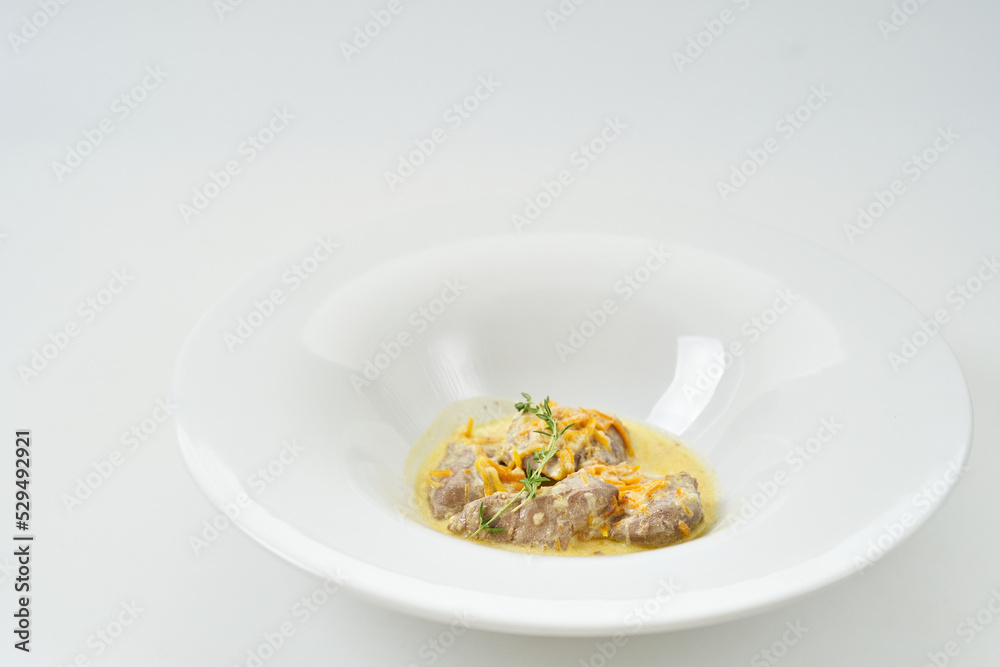 pork slices with sour cream sauce with vegetables pork slices with sour cream sauce with vegetables