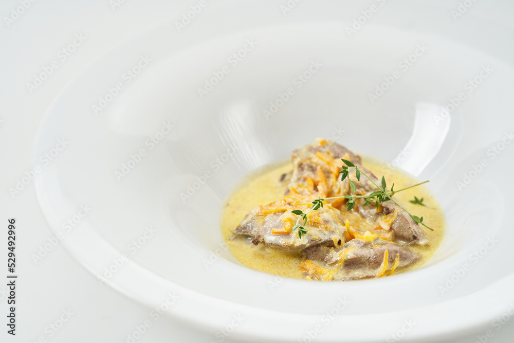 pork slices with sour cream sauce with vegetables pork slices with sour cream sauce with vegetables
