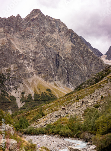 Randonneur le long du Vénéon, hiker along Veneon river photo