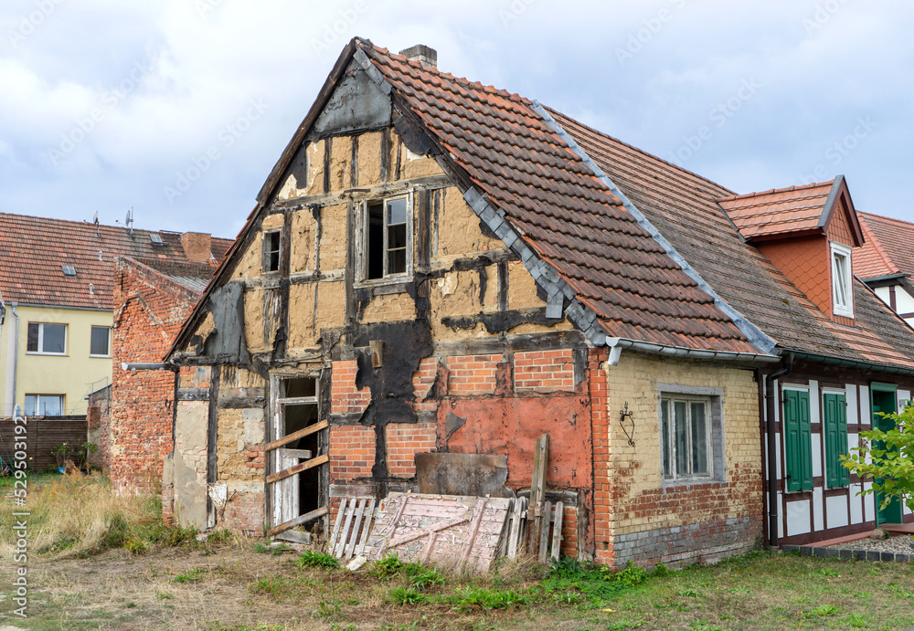 Small, old, desolate half-timbered house Small, old, desolate half-timbered house