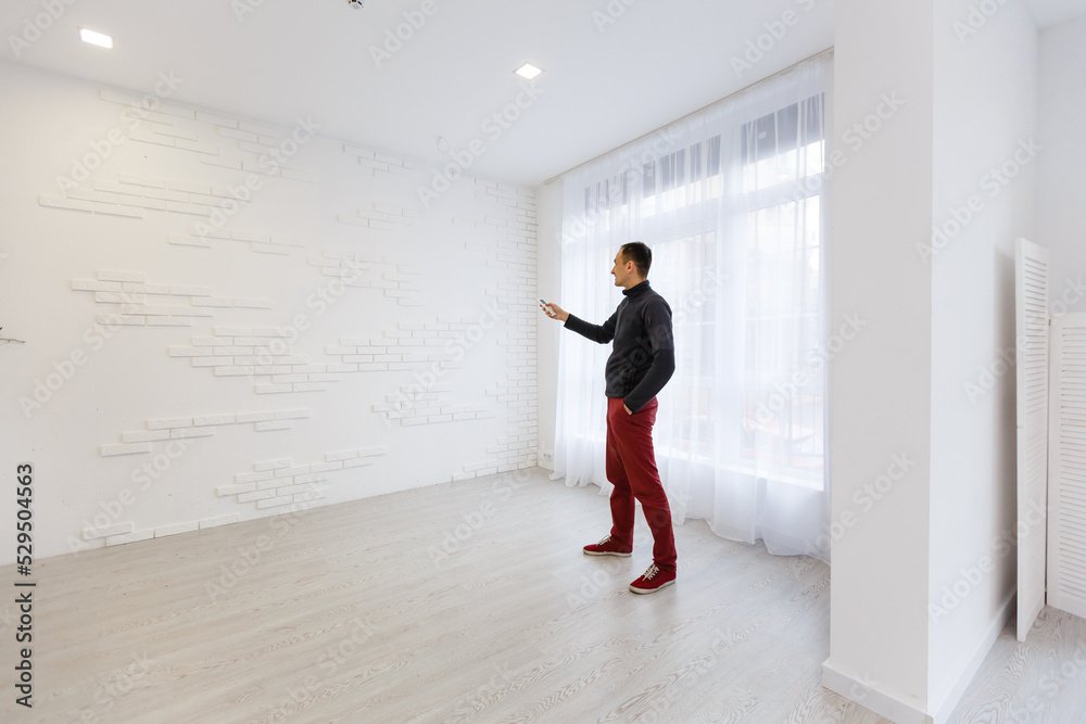 man holding a remote control