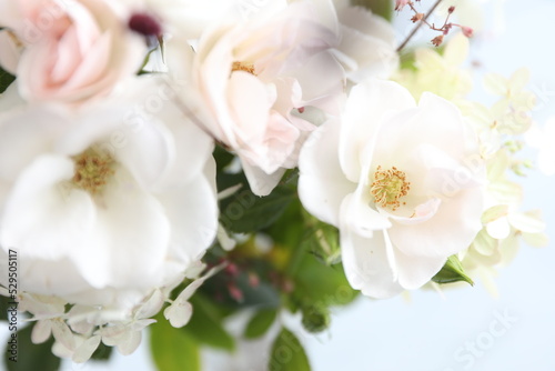 Bouquet with white roses and hydrangeas in the interior