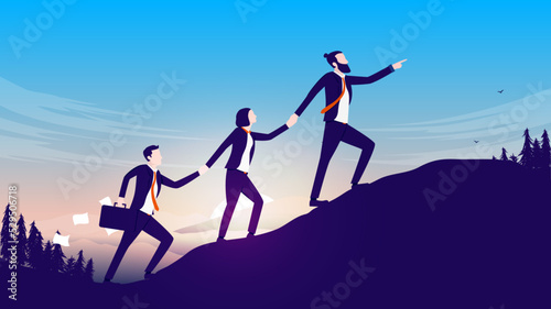 Business leadership and teamwork illustration with team of people walking  up hill towards top and success. cooperation and team spirit concept