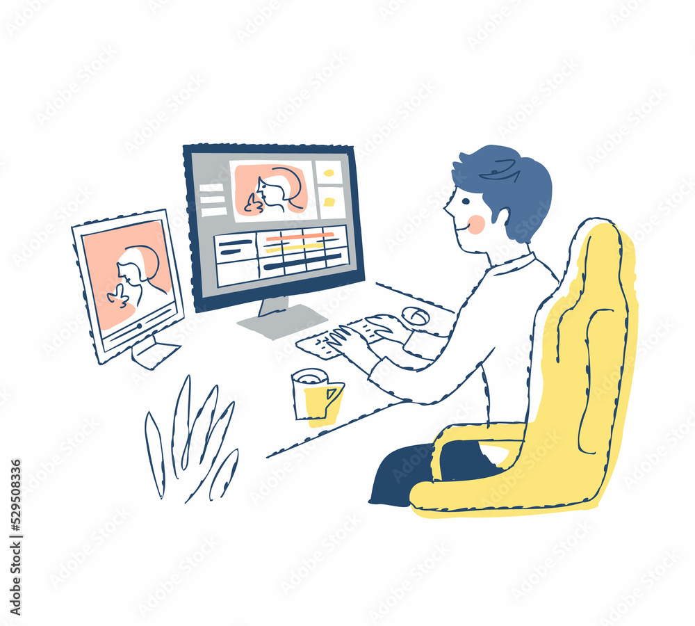 パソコンで動画編集作業をしている男性