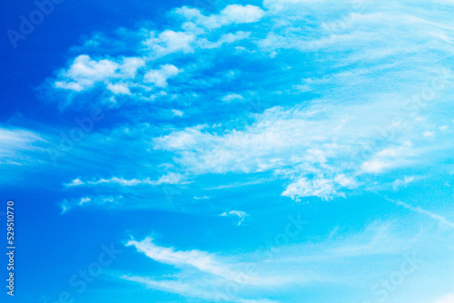 Beautiful wavy clouds spread across the sky. Background, wallpaper for designers