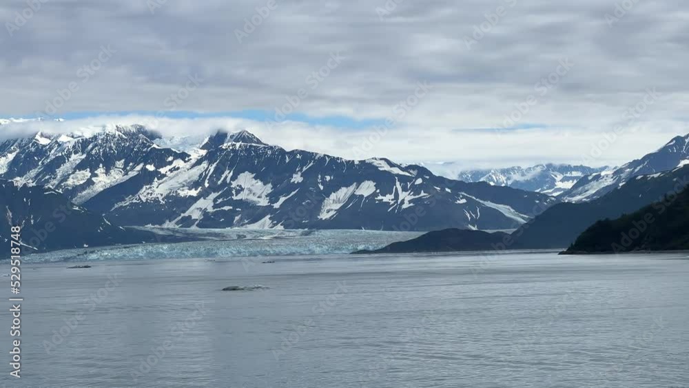 Coastal mountains and views from a cruise ship close to the Hubbard Glacier in Alaska. The Hubbard Glacier is a popular stop for Alaskan cruises. Coastal mountains and views from a cruise ship close to the Hubbard Glacier in Alaska. The Hubbard Glacier is a popular stop for Alaskan cruises.