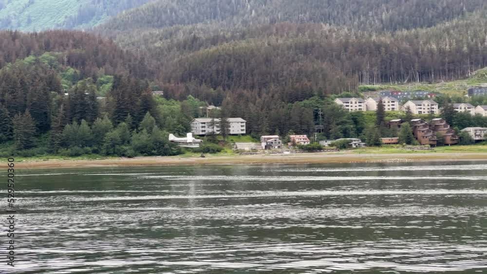 Float plane landing in the harbor at Juneau, Alaska. 