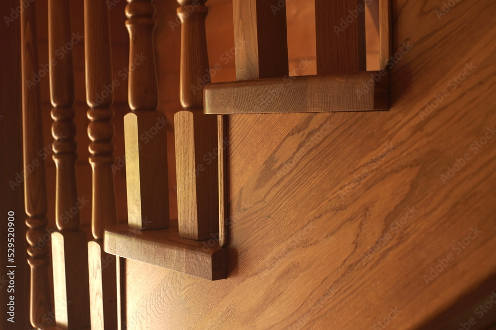 wooden oak stairs with balusters