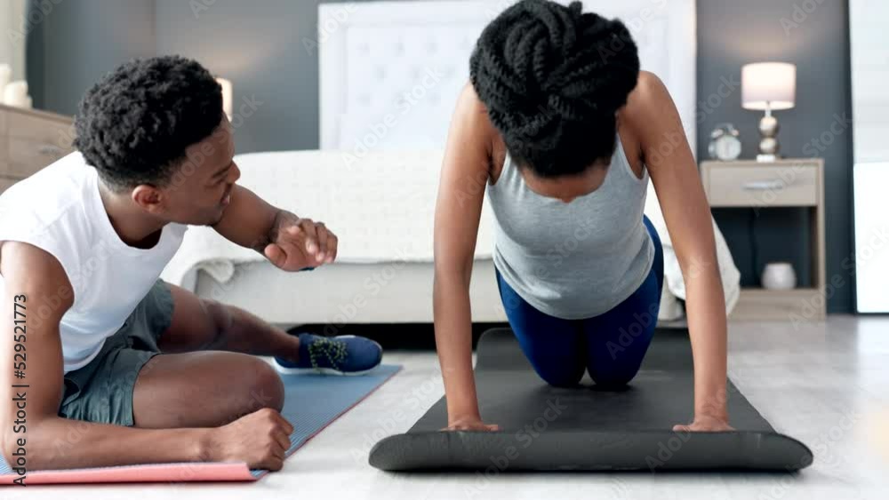 Push ups, motivation and personal trainer couple in bedroom or home doing workout training or exercise together for fitness, wellness or health goal, Love, support and help of black people exercising Push ups, motivation and personal trainer couple in bedroom or home doing workout training or exercise together for fitness, wellness or health goal, Love, support and help of black people exercising