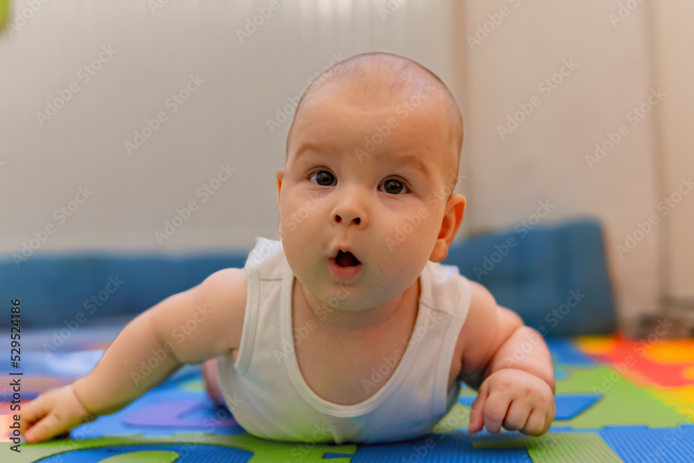 Cute 6 month baby trying to craw Cute 6 month baby trying to craw
