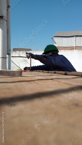 person on a roof